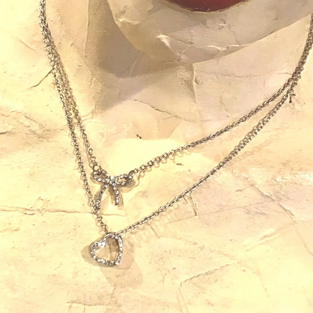 3/$32 Silver Tone Double Layered Rhinestone Heart & Bow Tie Dainty Necklace - Picture 4 of 8